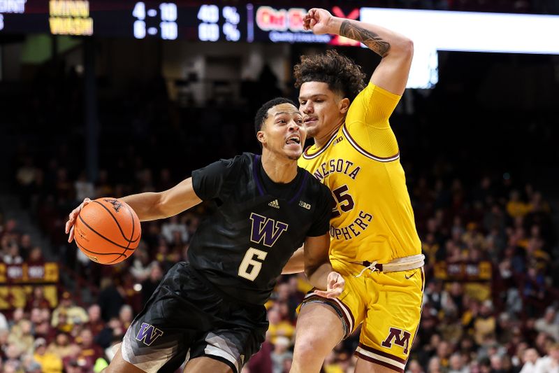 Feb 1, 2025; Minneapolis, Minnesota, USA; Washington Huskies guard Tyree Ihenacho (6) works around Minnesota Golden Gophers guard Lu'Cye Patterson (25) during the second half at Williams Arena. Mandatory Credit: Matt Krohn-Imagn Images