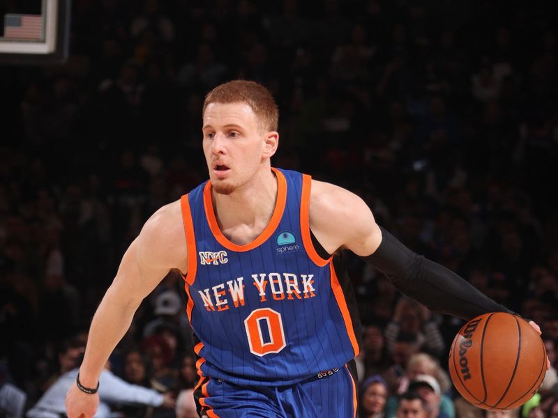 NEW YORK, NY - MARCH 23: Donte Divincenzo #0 of the New York Knicks looks on during the game against the Brooklyn Nets on March 23, 2024 at Madison Square Garden in New York City, New York.  NOTE TO USER: User expressly acknowledges and agrees that, by downloading and or using this photograph, User is consenting to the terms and conditions of the Getty Images License Agreement. Mandatory Copyright Notice: Copyright 2024 NBAE  (Photo by Nathaniel S. Butler/NBAE via Getty Images)