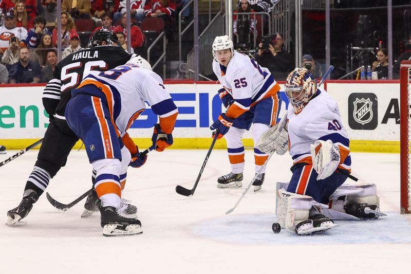 Apr 15, 2024; Newark, New Jersey, USA; New York Islanders goaltender Semyon Varlamov (40) makes a save against the New Jersey Devils during the second period at Prudential Center. Mandatory Credit: Ed Mulholland-USA TODAY Sports