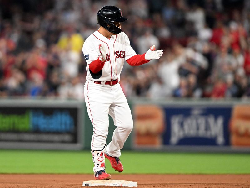 May 31, 2023; Boston, Massachusetts, USA; Boston Red Sox left fielder Masataka Yoshida (7) reacts after hitting a double against the Cincinnati Reds during the eighth inning at Fenway Park. Mandatory Credit: Brian Fluharty-USA TODAY Sports