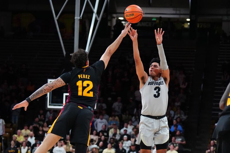 Feb 8, 2024; Boulder, Colorado, USA; Arizona State Sun Devils guard Jose Perez (12) tips a shot released by Colorado Buffaloes guard Julian Hammond III (3) in the second half at the CU Events Center. Mandatory Credit: Ron Chenoy-USA TODAY Sports