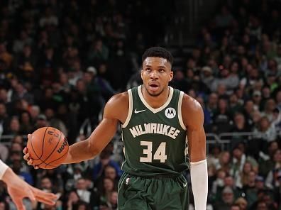 MILWAUKEE, WI - DECEMBER 21:  Giannis Antetokounmpo #34 of the Milwaukee Bucks handles the ball during the game against the Orlando Magic on December 21, 2023 at the Fiserv Forum Center in Milwaukee, Wisconsin. NOTE TO USER: User expressly acknowledges and agrees that, by downloading and or using this Photograph, user is consenting to the terms and conditions of the Getty Images License Agreement. Mandatory Copyright Notice: Copyright 2023 NBAE (Photo by Gary Dineen/NBAE via Getty Images). 