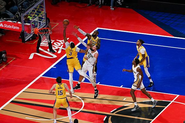 LAS VEGAS, NEVADA - DECEMBER 7: Anthony Davis (3), Austin Reaves (15), LeBron James (23) of Los Angeles Lakers and Jonas Valanciunas (17) of New Orleans Pelicans in action during NBA In-Season Tournament Semifinals game between Los Angeles Lakers and New Orleans Pelicans at the T-Mobile Arena in Las Vegas, Nevada, United States on December 7, 2023. (Photo by Tayfun Coskun/Anadolu via Getty Images)