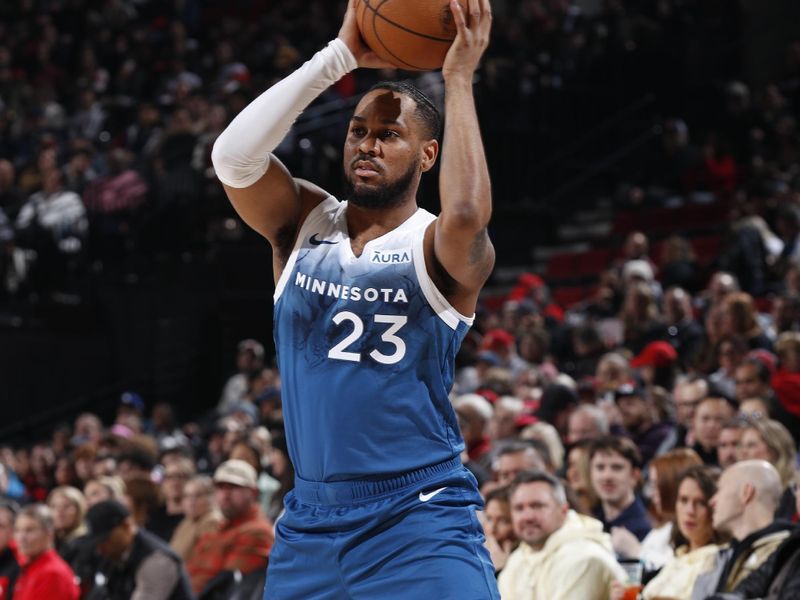 PORTLAND, OR - FEBRUARY 15: Troy Brown Jr. #23 of the Minnesota Timberwolves handles the ball during the game against the Portland Trail Blazers on February 15, 2024 at the Moda Center Arena in Portland, Oregon. NOTE TO USER: User expressly acknowledges and agrees that, by downloading and or using this photograph, user is consenting to the terms and conditions of the Getty Images License Agreement. Mandatory Copyright Notice: Copyright 2024 NBAE (Photo by Cameron Browne/NBAE via Getty Images)