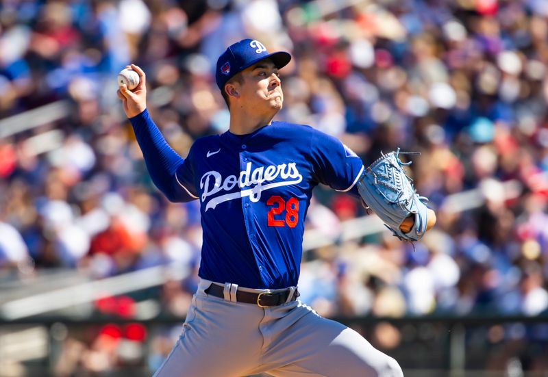 Mar 11, 2024; Goodyear, Arizona, USA; Los Angeles Dodgers pitcher Bobby Miller against the Cleveland Guardians during a spring training game at Goodyear Ballpark. Mandatory Credit: Mark J. Rebilas-USA TODAY Sports