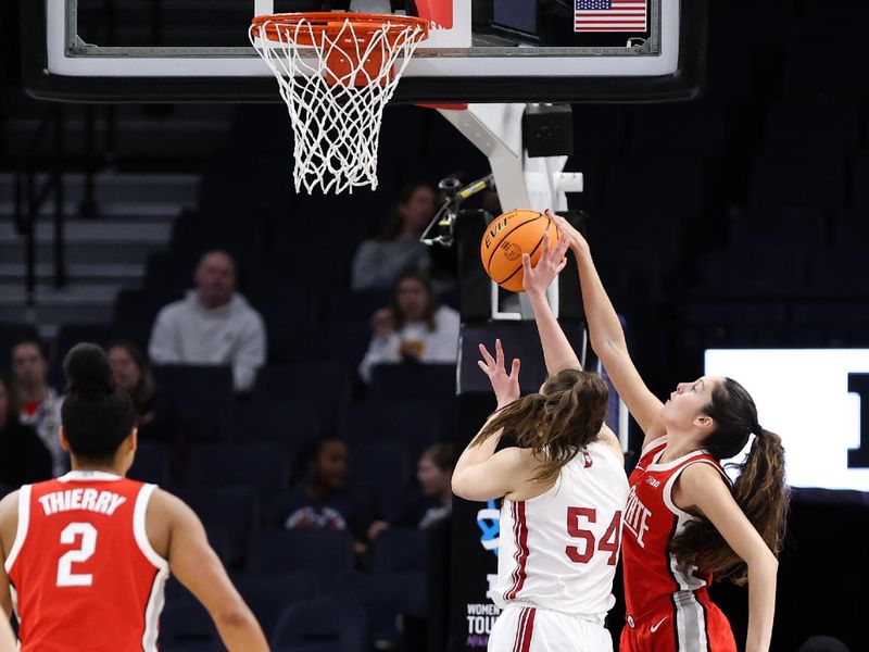 Mar 4, 2023; Minneapolis, MINN, USA; Ohio State Buckeyes guard Emma Shumate (5) blocks a shot by Indiana Hoosiers forward Mackenzie Holmes (54) during the first half at Target Center. Mandatory Credit: Matt Krohn-USA TODAY Sports
