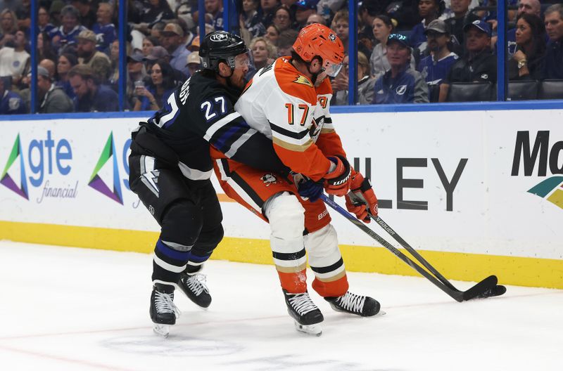 Oct 25, 2025; Tampa, Florida, USA; Tampa Bay Lightning defenseman Ryan McDonagh (27) defends Anaheim Ducks left wing Alex Killorn (17) during the second period at Benchmark International Arena. Mandatory Credit: Kim Klement Neitzel-Imagn Images