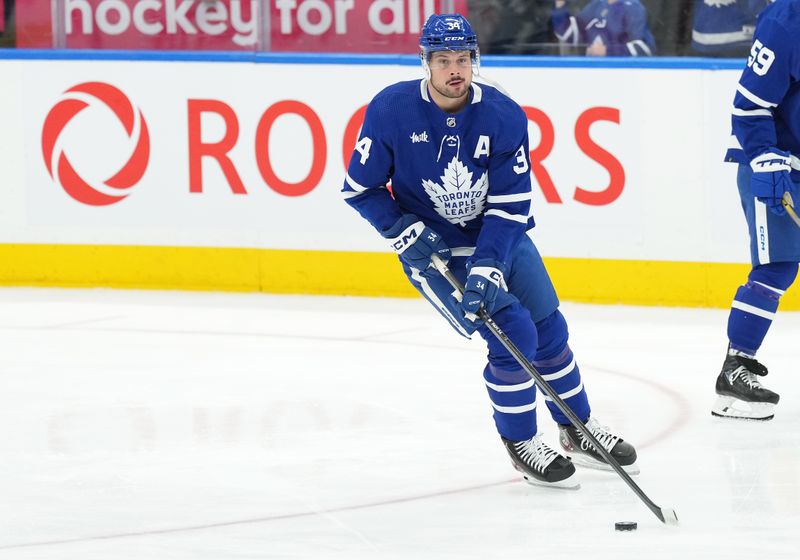 Apr 8, 2024; Toronto, Ontario, CAN; Toronto Maple Leafs center Auston Matthews (34) skates against the Pittsburgh Penguins during the warmup at Scotiabank Arena. Mandatory Credit: Nick Turchiaro-USA TODAY Sports