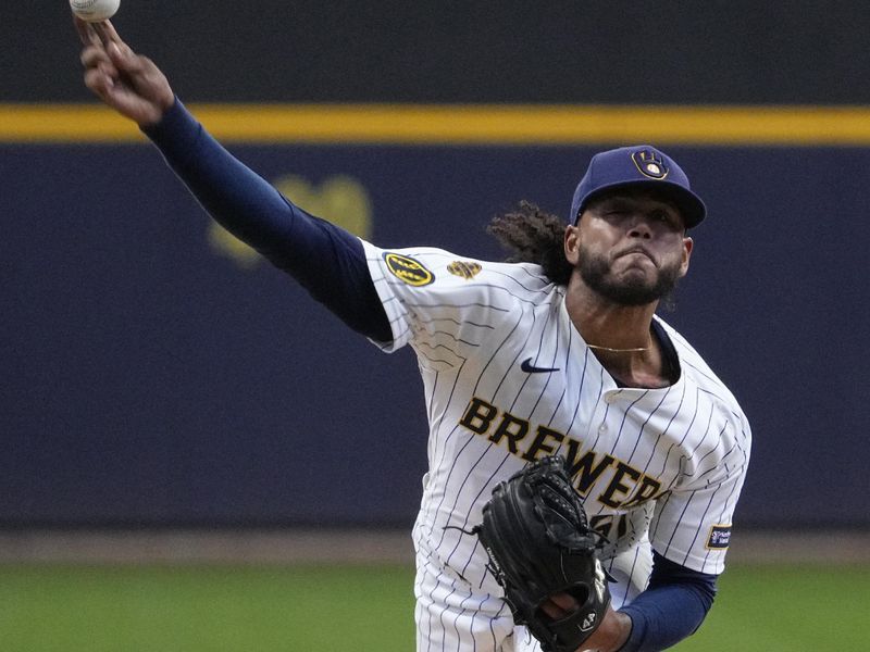 May 4, 2025; Milwaukee, Wisconsin, USA; Milwaukee Brewers pitcher Freddy Peralta (51) delivers a pitch against the Chicago Cubs in the first inning at American Family Field. Mandatory Credit: Michael McLoone-Imagn Images