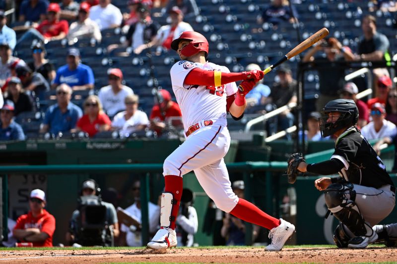 Sep 20, 2023; Washington, District of Columbia, USA; Washington Nationals designated hitter Joey Meneses (45) singles against the Chicago White Sox during the second inning at Nationals Park. Mandatory Credit: Brad Mills-USA TODAY Sports