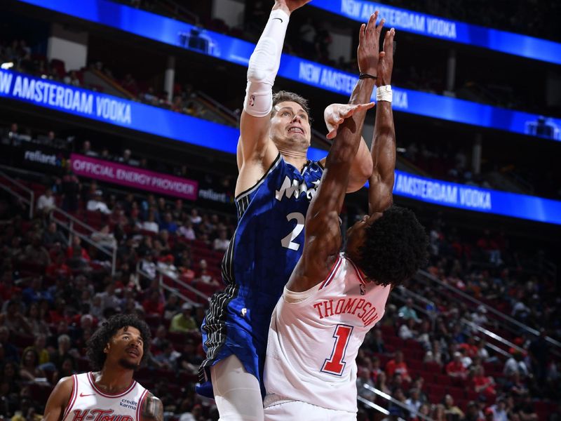 HOUSTON, TX - APRIL 9: Caleb Houstan #2 of the Orlando Magic shoots the ball during the game against the Houston Rockets on April 9, 2024 at the Toyota Center in Houston, Texas. NOTE TO USER: User expressly acknowledges and agrees that, by downloading and or using this photograph, User is consenting to the terms and conditions of the Getty Images License Agreement. Mandatory Copyright Notice: Copyright 2024 NBAE (Photo by Logan Riely/NBAE via Getty Images)