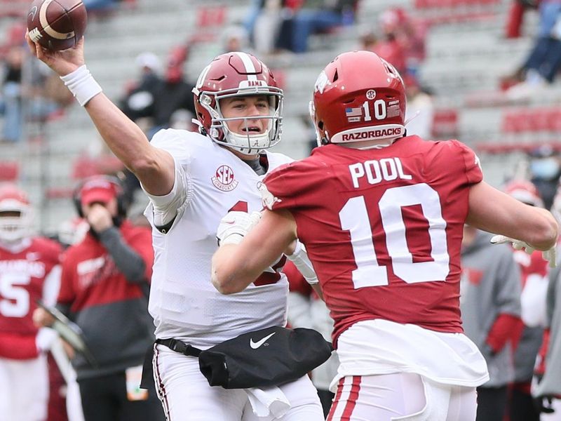 Dec 12, 2020; Fayetteville, Arkansas, USA;  Alabama Crimson Tide quarterback Mac Jones (10) passes in the second quarter against the Arkansas Razorbacks at Donald W. Reynolds Razorback Stadium. Mandatory Credit: Nelson Chenault-USA TODAY Sports