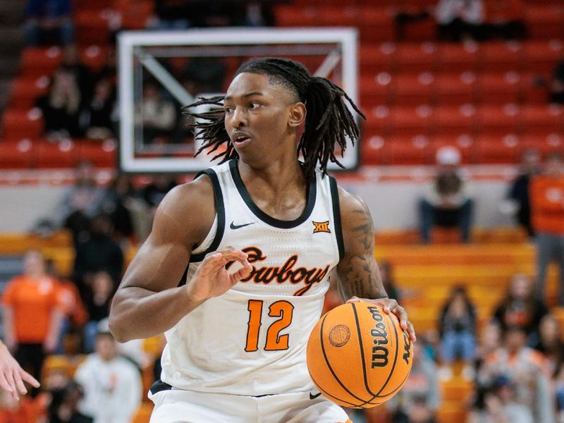 Feb 17, 2024; Stillwater, Oklahoma, USA; Oklahoma State Cowboys guard Javon Small (12) drives to the basket during the first half against the Brigham Young Cougars at Gallagher-Iba Arena. Mandatory Credit: William Purnell-USA TODAY Sports