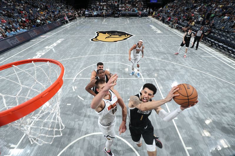 MEMPHIS, TN - APRIL 14: Scotty Pippen Jr. #1 of the Memphis Grizzlies drives to the basket during the game against the Denver Nuggets on April 14, 2024 at FedExForum in Memphis, Tennessee. NOTE TO USER: User expressly acknowledges and agrees that, by downloading and or using this photograph, User is consenting to the terms and conditions of the Getty Images License Agreement. Mandatory Copyright Notice: Copyright 2024 NBAE (Photo by Joe Murphy/NBAE via Getty Images)