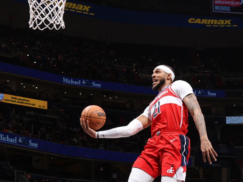 WASHINGTON, DC -? JANUARY 31:  Daniel Gafford #21 of the Washington Wizards goes to the basket during the game on January 31, 2024 at Capital One Arena in Washington, DC. NOTE TO USER: User expressly acknowledges and agrees that, by downloading and or using this Photograph, user is consenting to the terms and conditions of the Getty Images License Agreement. Mandatory Copyright Notice: Copyright 2024 NBAE (Photo by Stephen Gosling/NBAE via Getty Images)