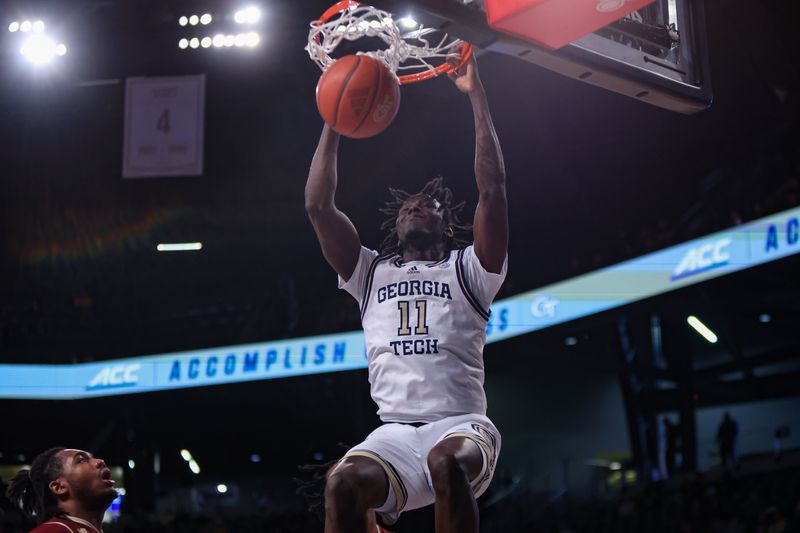 Jan 4, 2025; Atlanta, Georgia, USA; Georgia Tech Yellow Jackets forward Baye Ndongo (11) dunks against the Boston College Eagles in the second half at McCamish Pavilion. Mandatory Credit: Brett Davis-Imagn Images
