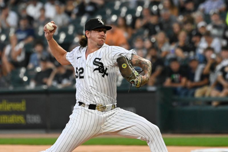 Aug 22, 2023; Chicago, Illinois, USA; Chicago White Sox starting pitcher Mike Clevinger (52) delivers against the Seattle Mariners during the first inning at Guaranteed Rate Field. Mandatory Credit: Matt Marton-USA TODAY Sports