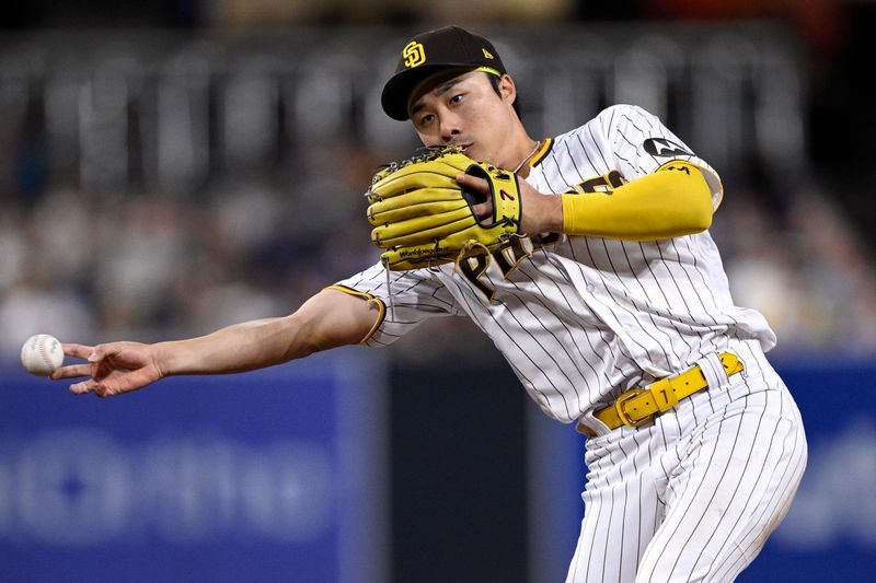 Aug 21, 2023; San Diego, California, USA; San Diego Padres second baseman Ha-seong Kim (7) throws to first base on a ground out by Miami Marlins second baseman Luis Arraez (not pictured) during the third inning at Petco Park. Mandatory Credit: Orlando Ramirez-USA TODAY Sports