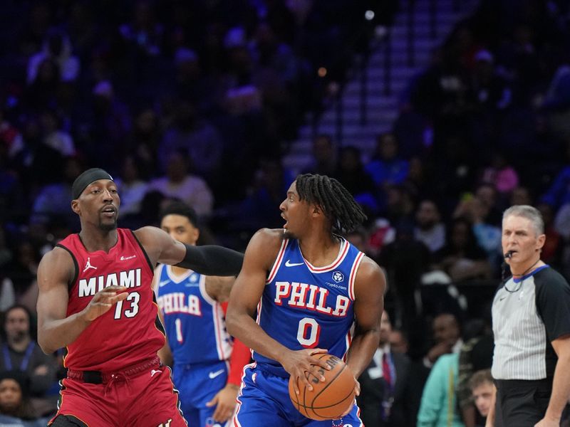 PHILADELPHIA, PA - FEBRUARY 14: Tyrese Maxey #0 of the Philadelphia 76ers looks to pass the ball during the game against the Miami Heat on February 14, 2024 at the Wells Fargo Center in Philadelphia, Pennsylvania NOTE TO USER: User expressly acknowledges and agrees that, by downloading and/or using this Photograph, user is consenting to the terms and conditions of the Getty Images License Agreement. Mandatory Copyright Notice: Copyright 2024 NBAE (Photo by Jesse D. Garrabrant/NBAE via Getty Images)