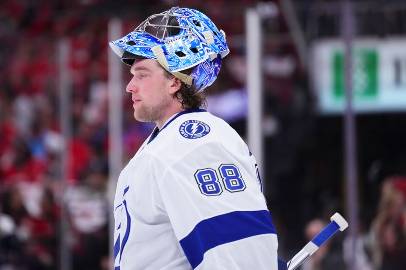 Apr 28, 2025; Sunrise, Florida, USA; Tampa Bay Lightning goaltender Andrei Vasilevskiy (88) looks on against the Florida Panthers during the first period in game four of the first round of the 2025 Stanley Cup Playoffs at Amerant Bank Arena. Mandatory Credit: Rich Storry-Imagn Images