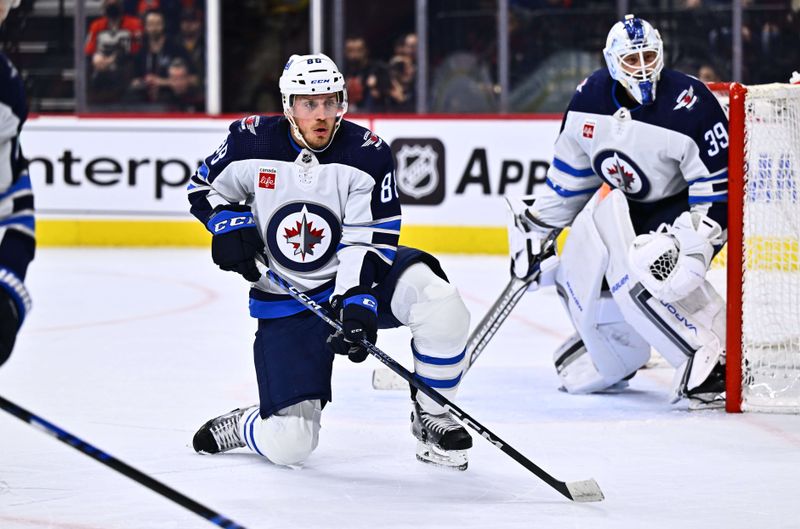 Feb 8, 2024; Philadelphia, Pennsylvania, USA; Winnipeg Jets defenseman Nate Schmidt (88) defends the net against the Philadelphia Flyers in the first period at Wells Fargo Center. Mandatory Credit: Kyle Ross-USA TODAY Sports