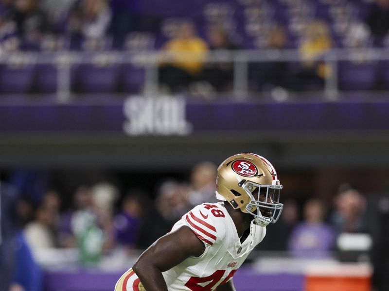 San Francisco 49ers linebacker Oren Burks (48) warms up before an NFL football game against the Minnesota Vikings, Monday, Oct. 23, 2023 in Minneapolis. (AP Photo/Stacy Bengs)