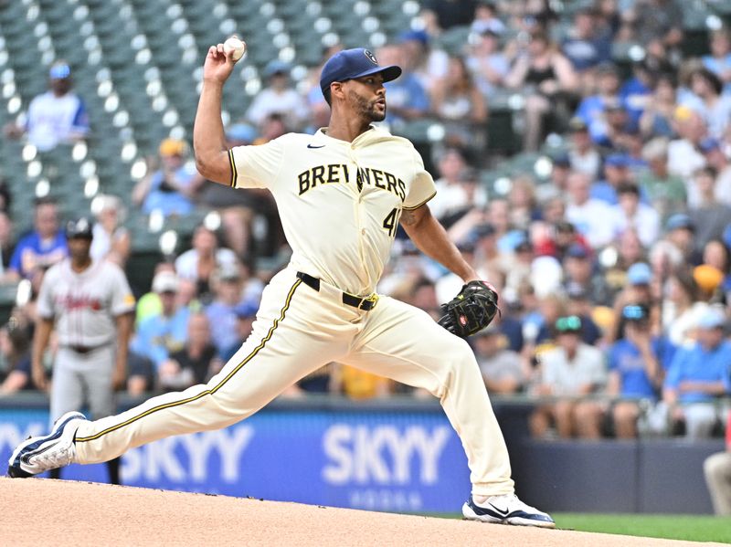 Jul 30, 2024; Milwaukee, Wisconsin, USA; Milwaukee Brewers starting pitcher Joe Ross delivers a pitch against the Atlanta Braves in the first inning at American Family Field. Mandatory Credit: Michael McLoone-USA TODAY Sports