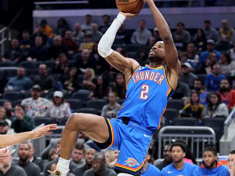 INDIANAPOLIS, INDIANA - MARCH 31:  Shai Gilgeous-Alexander #2 of the Oklahoma City Thunder against Indiana Pacers at Gainbridge Fieldhouse on March 31, 2023 in Indianapolis, Indiana.    NOTE TO USER: User expressly acknowledges and agrees that, by downloading and/or using this photograph, User is consenting to the terms and conditions of the Getty Images License Agreement. (Photo by Andy Lyons/Getty Images)