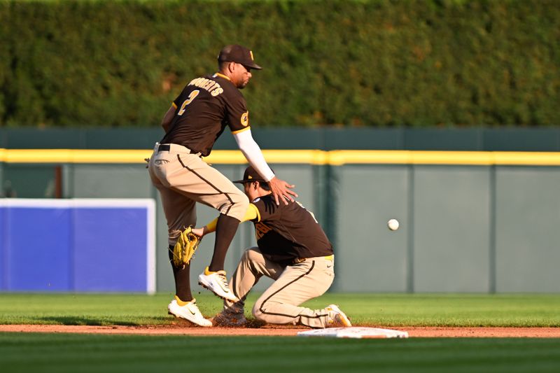 Jul 21, 2023; Detroit, Michigan, USA;  San Diego Padres second baseman Ha-Seong Kim (7) (right) collides with shortstop Xander Bogaerts (2) on a ground ball up the middle off the bat of Detroit Tigers shortstop Javier Baez (28) (not pictured) in the second inning at Comerica Park. Kim was charged with an error on the play. Mandatory Credit: Lon Horwedel-USA TODAY Sports