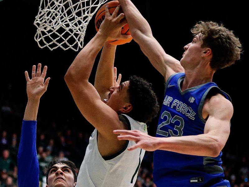 Jan 16, 2024; Fort Collins, Colorado, USA; Colorado State Rams forward Joel Scott (1) is fouled by Air Force Falcons guard Kellan Boylan (23) as forward Beau Becker (14) defends in the second half at Moby Arena. Mandatory Credit: Isaiah J. Downing-USA TODAY Sports