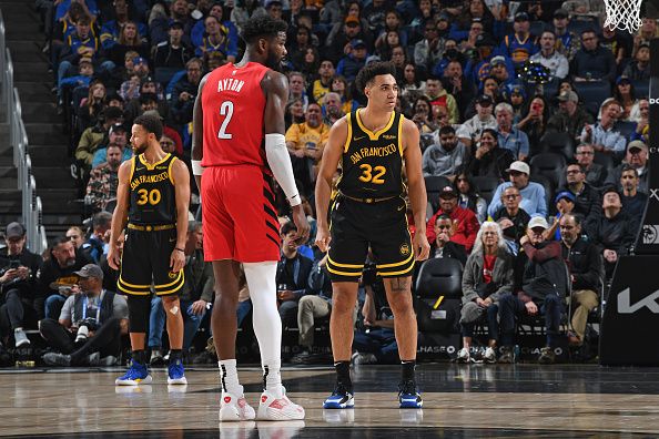 SAN FRANCISCO, CA - DECEMBER 23: Trayce Jackson-Davis #32 of the Golden State Warriors  looks on during the game against the Portland Trail Blazers on December 23, 2023 at Chase Center in San Francisco, California. NOTE TO USER: User expressly acknowledges and agrees that, by downloading and or using this photograph, user is consenting to the terms and conditions of Getty Images License Agreement. Mandatory Copyright Notice: Copyright 2023 NBAE (Photo by Noah Graham/NBAE via Getty Images)