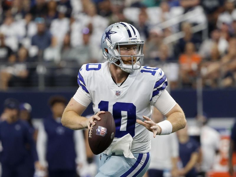 Dallas Cowboys quarterback Cooper Rush (10) prepares to throw a pass against the Cincinnati Bengals during an NFL Football game in Arlington, Texas, Sunday, Sept. 18, 2022. (AP Photo/Michael Ainsworth)