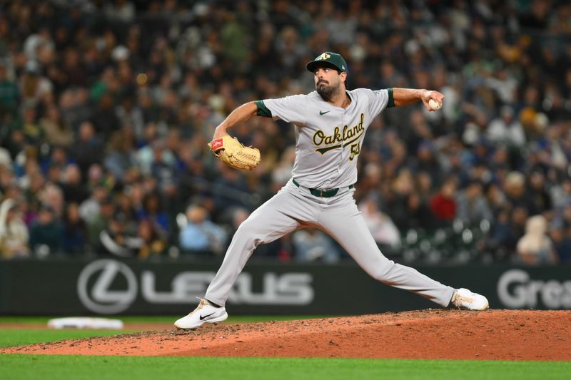 Sep 27, 2024; Seattle, Washington, USA; Oakland Athletics relief pitcher Scott Alexander (54) pitches to the Seattle Mariners during the eighth inning at T-Mobile Park. Mandatory Credit: Steven Bisig-Imagn Images