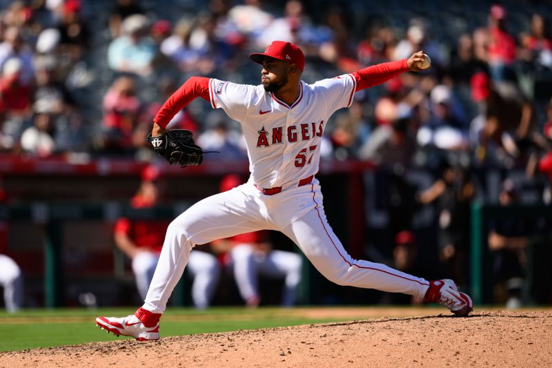 Sep 28, 2025; Anaheim, California, USA; Los Angeles Angels relief pitcher Sammy Peralta (57) delivers during the ninth inning against the Houston Astros at Angel Stadium. Mandatory Credit: William Liang-Imagn Images
