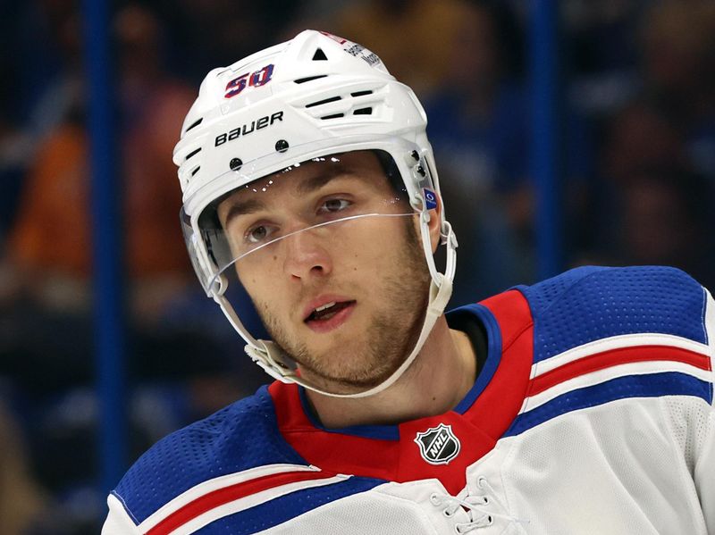 Mar 14, 2024; Tampa, Florida, USA; New York Rangers left wing Will Cuylle (50) looks on against the Tampa Bay Lightning during the second period at Amalie Arena. Mandatory Credit: Kim Klement Neitzel-USA TODAY Sports