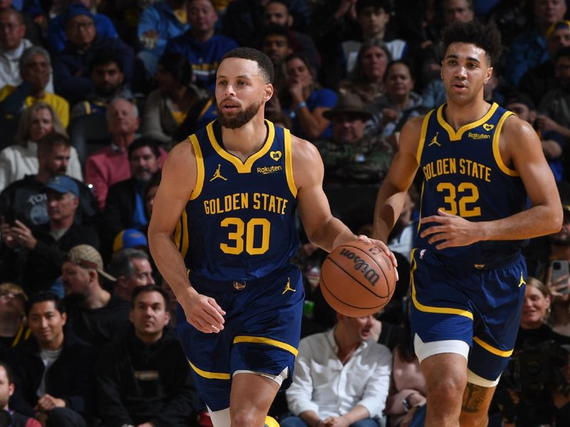 SAN FRANCISCO, CA - FEBRUARY 22:  Stephen Curry #30 of the Golden State Warriors handles the ball during the game  on February 22, 2024 at Chase Center in San Francisco, California. NOTE TO USER: User expressly acknowledges and agrees that, by downloading and or using this photograph, user is consenting to the terms and conditions of Getty Images License Agreement. Mandatory Copyright Notice: Copyright 2024 NBAE (Photo by Noah Graham/NBAE via Getty Images)