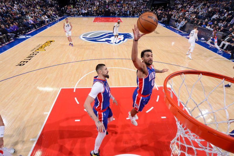 SACRAMENTO, CA - NOVEMBER 16: Trey Lyles #41 of the Sacramento Kings goes up for the rebound during the game against the Utah Jazz on November 16, 2024 at Golden 1 Center in Sacramento, California. NOTE TO USER: User expressly acknowledges and agrees that, by downloading and or using this Photograph, user is consenting to the terms and conditions of the Getty Images License Agreement. Mandatory Copyright Notice: Copyright 2024 NBAE (Photo by Rocky Widner/NBAE via Getty Images)