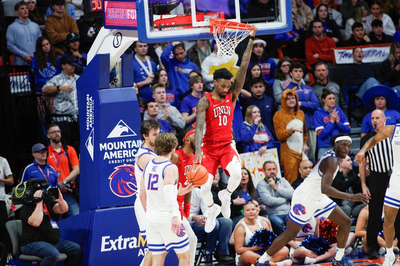 Jan 16, 2024; Boise, Idaho, USA; UNLV Rebels forward Kalib Boone (10) dunk during the second half against the Boise State Broncos at ExtraMile Arena. UNLV beats Boise State 68-64. Mandatory Credit: Brian Losness-USA TODAY Sports