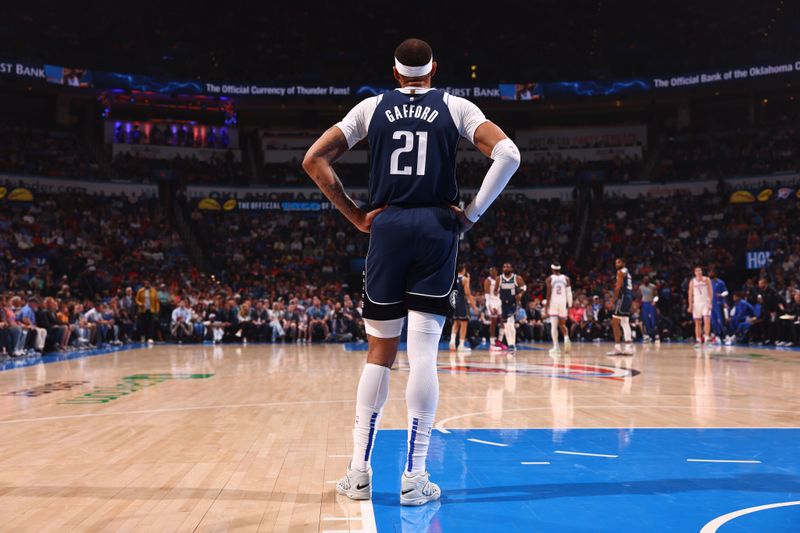 OKLAHOMA CITY, OK - MARCH 14: Daniel Gafford #21 of the Dallas Mavericks looks on during the game against the Oklahoma City Thunder on March 13, 2024 at Paycom Arena in Oklahoma City, Oklahoma. NOTE TO USER: User expressly acknowledges and agrees that, by downloading and or using this photograph, User is consenting to the terms and conditions of the Getty Images License Agreement. Mandatory Copyright Notice: Copyright 2024 NBAE (Photo by Zach Beeker/NBAE via Getty Images)