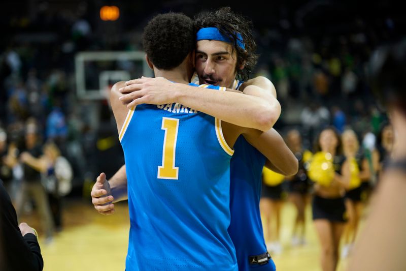 Feb 11, 2023; Eugene, Oregon, USA; UCLA Bruins guard Jaime Jaquez Jr. (24) celebrates with guard Abramo Canka (1) after a game against the Oregon Ducks  at Matthew Knight Arena. Mandatory Credit: Troy Wayrynen-USA TODAY Sports