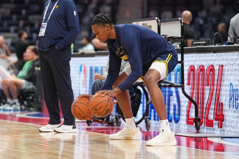 ABU DHABI, UAE - OCTOBER 6: Peyton Watson #8 of the Denver Nuggets warms up before the game against the Boston Celtics during the 2024 Global Games on October 6, 2024 at the Etihad Arena in Abu Dhabi, United Arab Emirates. NOTE TO USER: User expressly acknowledges and agrees that, by downloading and/or using this Photograph, user is consenting to the terms and conditions of the Getty Images License Agreement. Mandatory Copyright Notice: Copyright 2024 NBAE (Photo by Garrett Ellwood/NBAE via Getty Images)