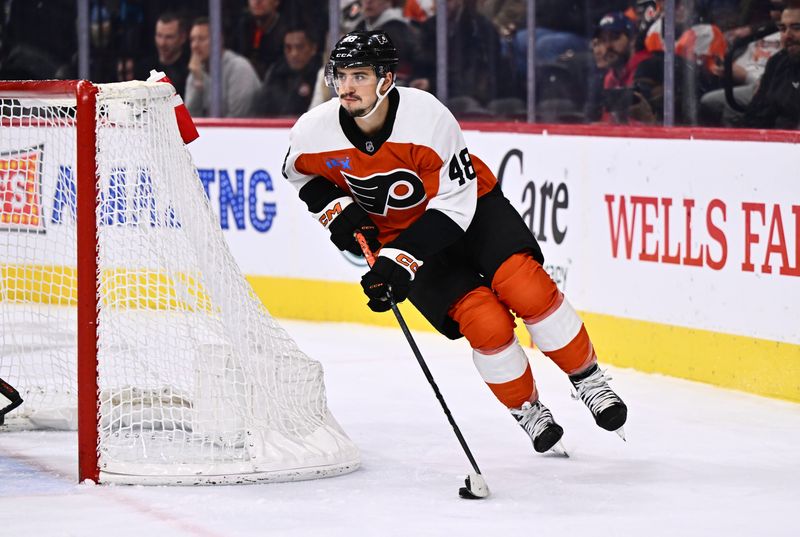 Dec 14, 2023; Philadelphia, Pennsylvania, USA; Philadelphia Flyers center Morgan Frost (48) controls the puck against the Washington Capitals in the second period at Wells Fargo Center. Mandatory Credit: Kyle Ross-USA TODAY Sports