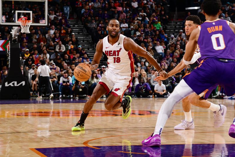 PHOENIX, AZ - NOVEMBER 6: Alec Burks #18 of the Miami Heat dribbles the ball during the game against the Phoenix Suns on November 6, 2024 at Footprint Center in Phoenix, Arizona. NOTE TO USER: User expressly acknowledges and agrees that, by downloading and or using this photograph, user is consenting to the terms and conditions of the Getty Images License Agreement. Mandatory Copyright Notice: Copyright 2024 NBAE (Photo by Kate Frese/NBAE via Getty Images)