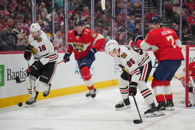 Feb 1, 2025; Sunrise, Florida, USA;  Chicago Blackhawks center Jason Dickinson (16) looks to keep the puck in the Florida Panthers zone in the first period at Amerant Bank Arena. Mandatory Credit: Jim Rassol-Imagn Images