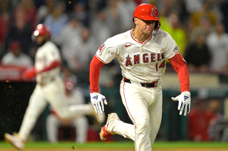 May 29, 2024; Anaheim, California, USA;  Los Angeles Angels catcher Logan O'Hoppe (14) runs to first on a ground out to end the game against the New York Yankees in the ninth inning at Angel Stadium. Mandatory Credit: Jayne Kamin-Oncea-USA TODAY Sports