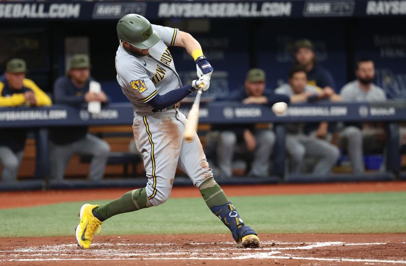 May 20, 2023; St. Petersburg, Florida, USA; Milwaukee Brewers second baseman Owen Miller (6) hits a home run against the Tampa Bay Rays during the third inning  at Tropicana Field. Mandatory Credit: Kim Klement-USA TODAY Sports