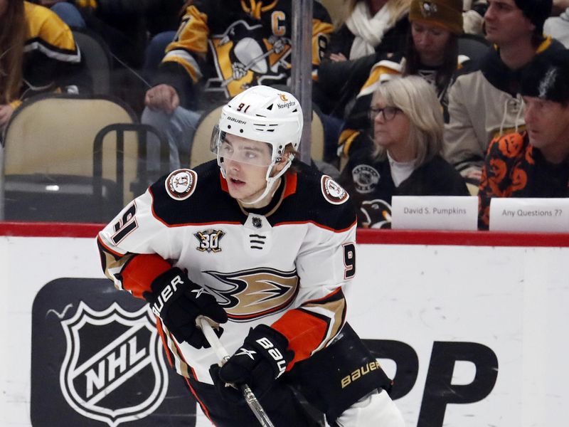 Oct 30, 2023; Pittsburgh, Pennsylvania, USA;  Anaheim Ducks center Leo Carlsson (91) skates with the puck against the Pittsburgh Penguins during the third period at PPG Paints Arena. Anaheim won 4-3. Mandatory Credit: Charles LeClaire-USA TODAY Sports