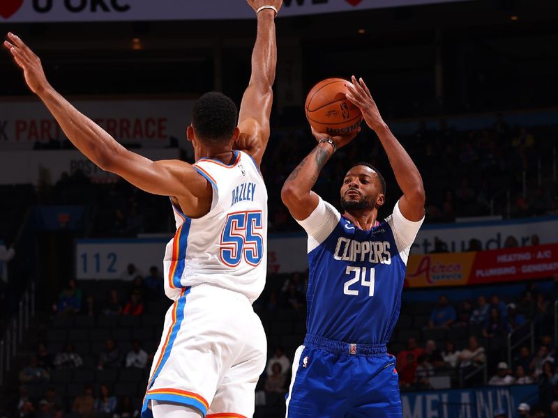 OKLAHOMA CITY, OK - OCTOBER 25: Norman Powell #24 of the LA Clippers shoots the ball during the game against the Oklahoma City Thunder on October 25, 2022 at Paycom Arena in Oklahoma City, Oklahoma. NOTE TO USER: User expressly acknowledges and agrees that, by downloading and or using this photograph, User is consenting to the terms and conditions of the Getty Images License Agreement. Mandatory Copyright Notice: Copyright 2022 NBAE (Photo by Zach Beeker/NBAE via Getty Images)