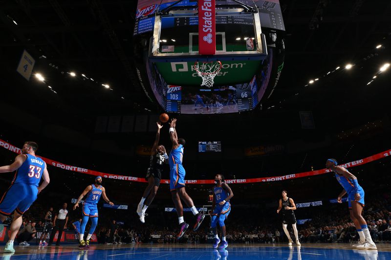 OKLAHOMA CITY, OK - APRIL 10:  Jamaree Bouyea #15 of the San Antonio Spurs  drives to the basket during the game against the Oklahoma City Thunder on April 10, 2024 at Paycom Arena in Oklahoma City, Oklahoma. NOTE TO USER: User expressly acknowledges and agrees that, by downloading and or using this photograph, User is consenting to the terms and conditions of the Getty Images License Agreement. Mandatory Copyright Notice: Copyright 2024 NBAE (Photo by Zach Beeker/NBAE via Getty Images)