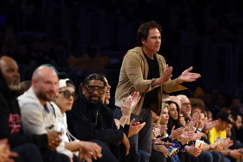 LOS ANGELES, CALIFORNIA - FEBRUARY 13: Detroit Pistons owner Tom Gores reacts to a play during the game against the Los Angeles Lakers at Crypto.com Arena on February 13, 2024 in Los Angeles, California. NOTE TO USER: User expressly acknowledges and agrees that, by downloading and or using this photograph, user is consenting to the terms and conditions of the Getty Images License Agreement.  (Photo by Katelyn Mulcahy/Getty Images)